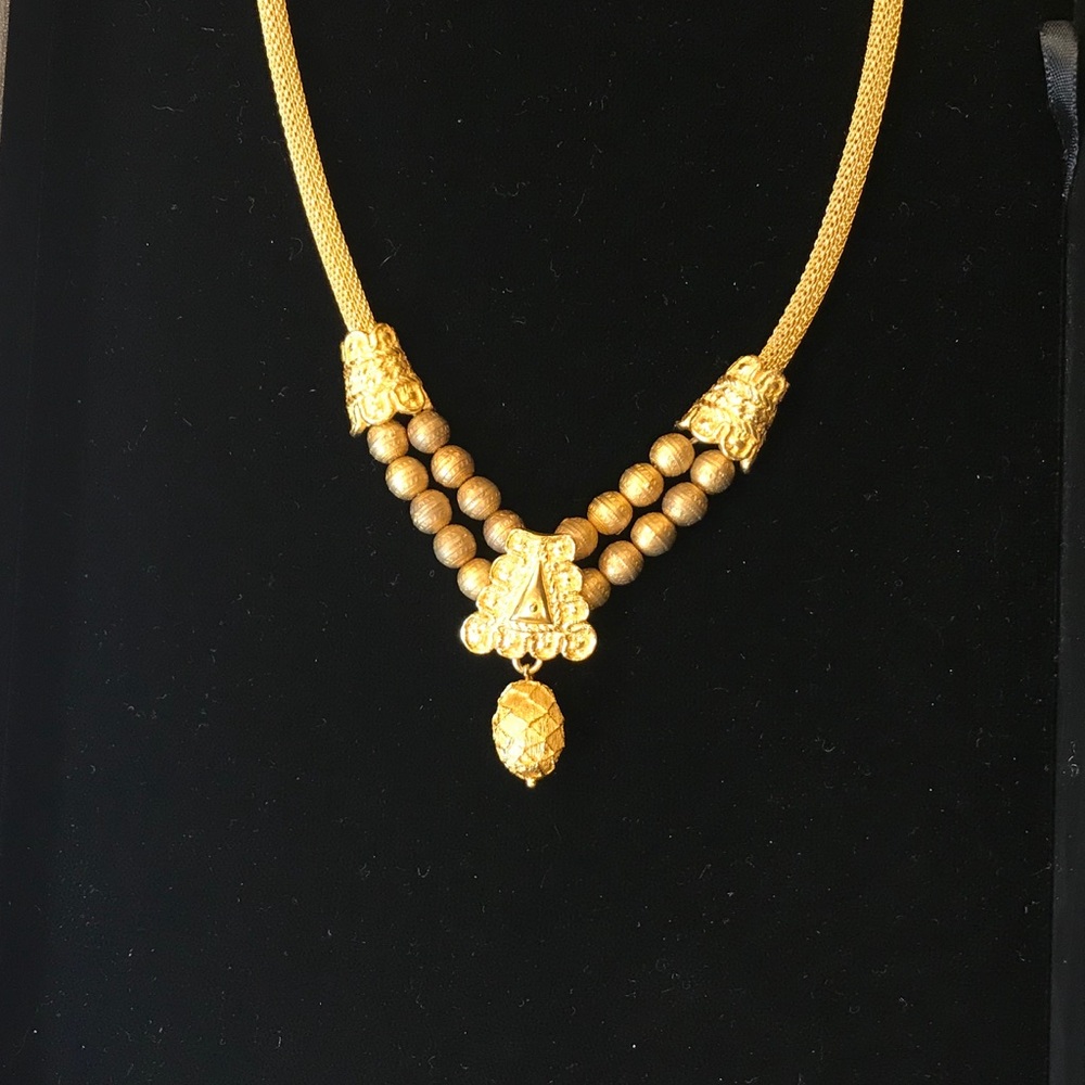 Gorgeous brush gold tone statement necklace
